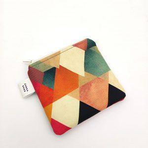 Neceser mini triángulos fucsia